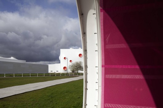 Illustration for article titled Technicolor Bullet Holes Make This the Perfect Home for Olympic Shooting